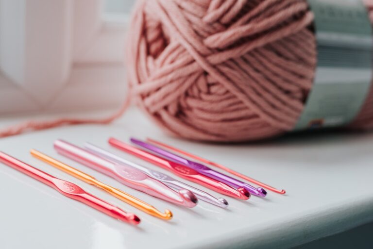 yarn skein and hooks on table
