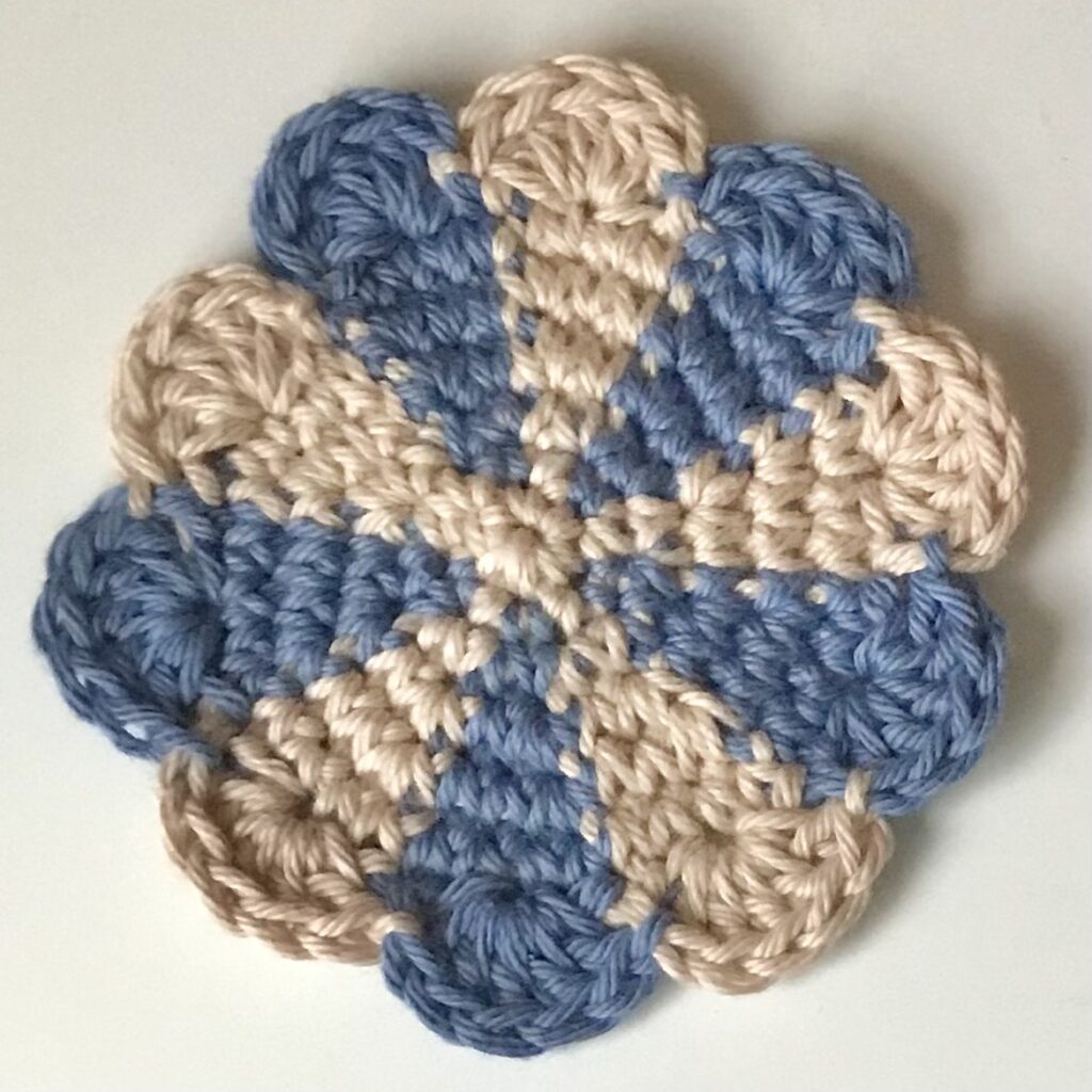 blue and cream striped flower coaster