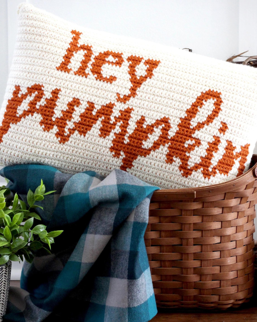 white "hey pumpkin" pillowcase in basket