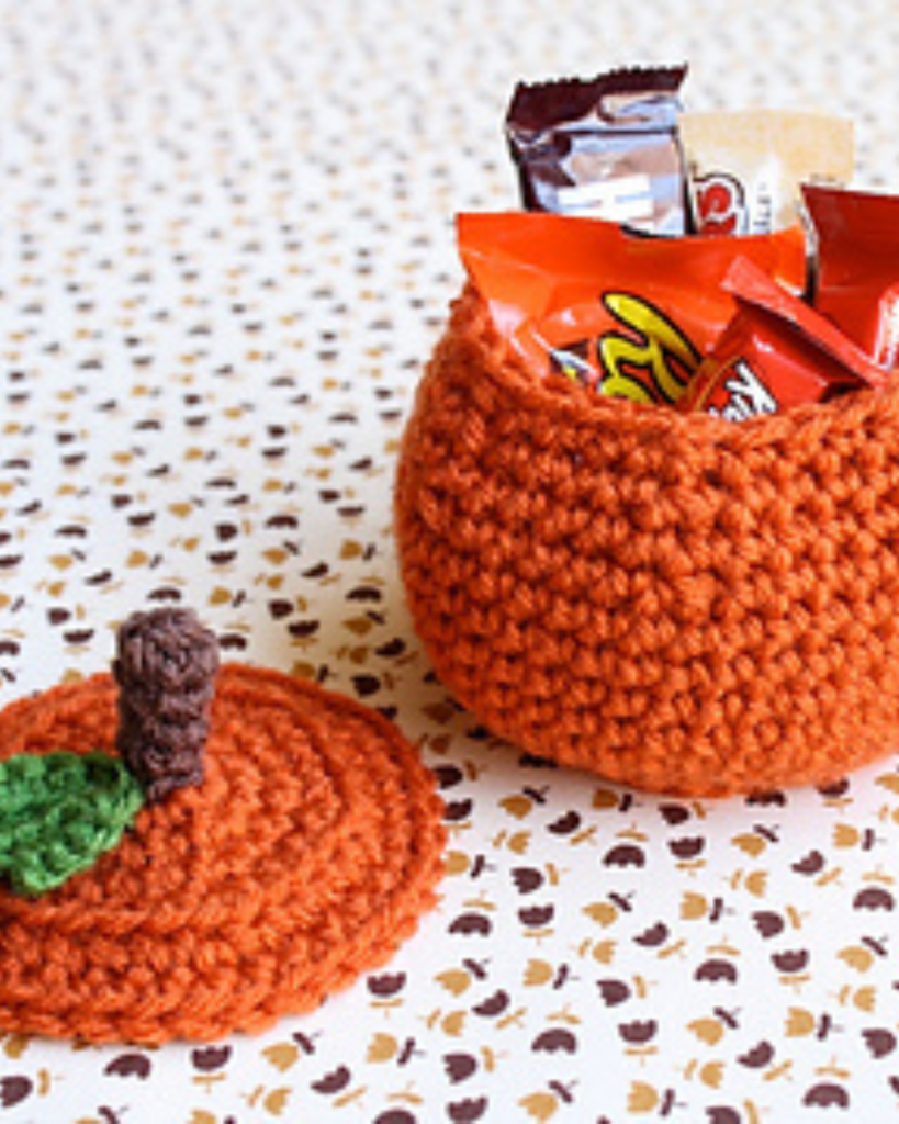 orange crochet pumpkin with candy inside