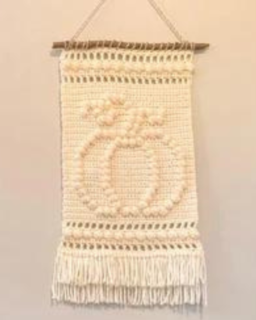 white crochet pumpkin wallhanging