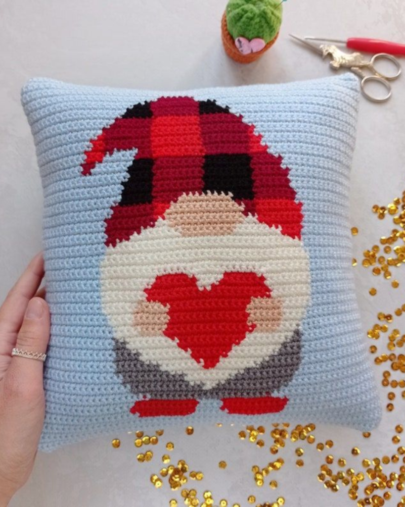 crochet pillow case cover with red plaid gnome holding a heart