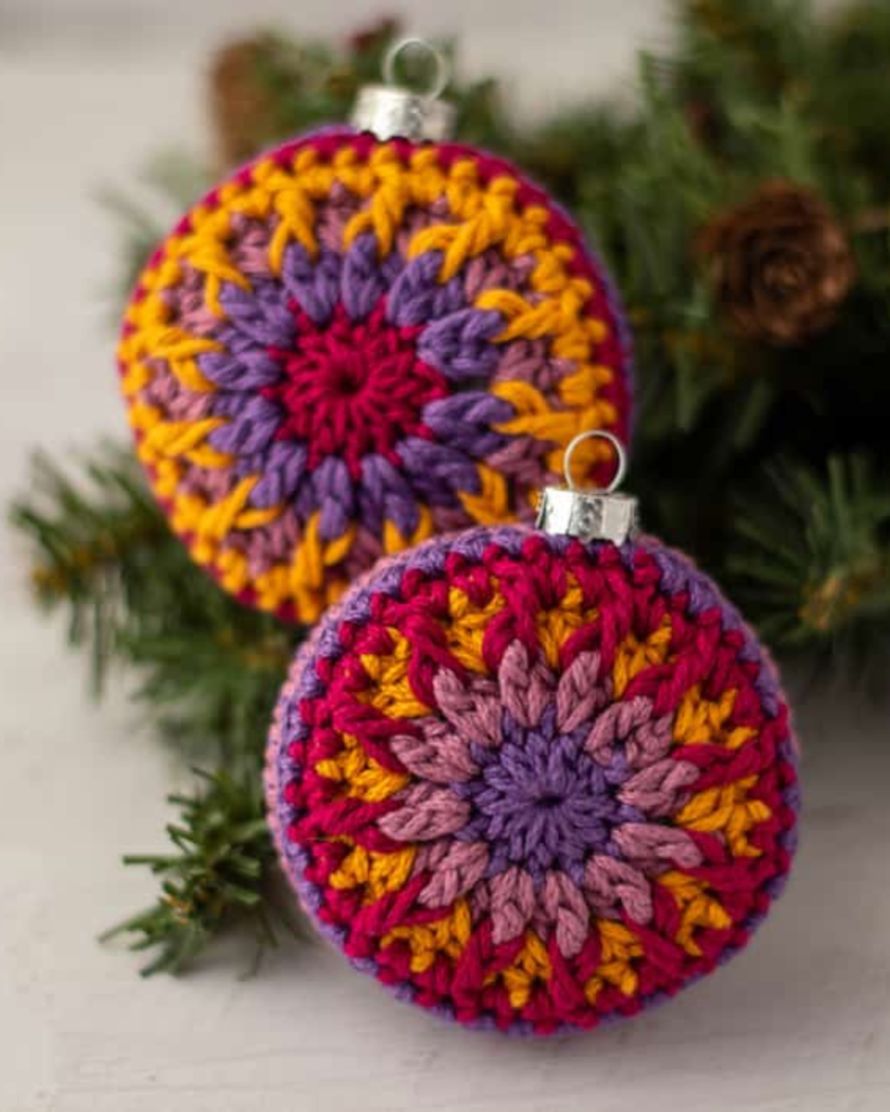 two crochet circular ornaments in bright colors