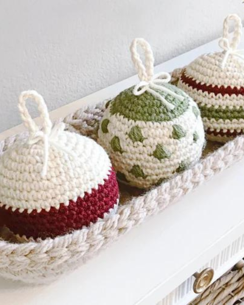 three crochet spherical ornaments in crochet a basket
