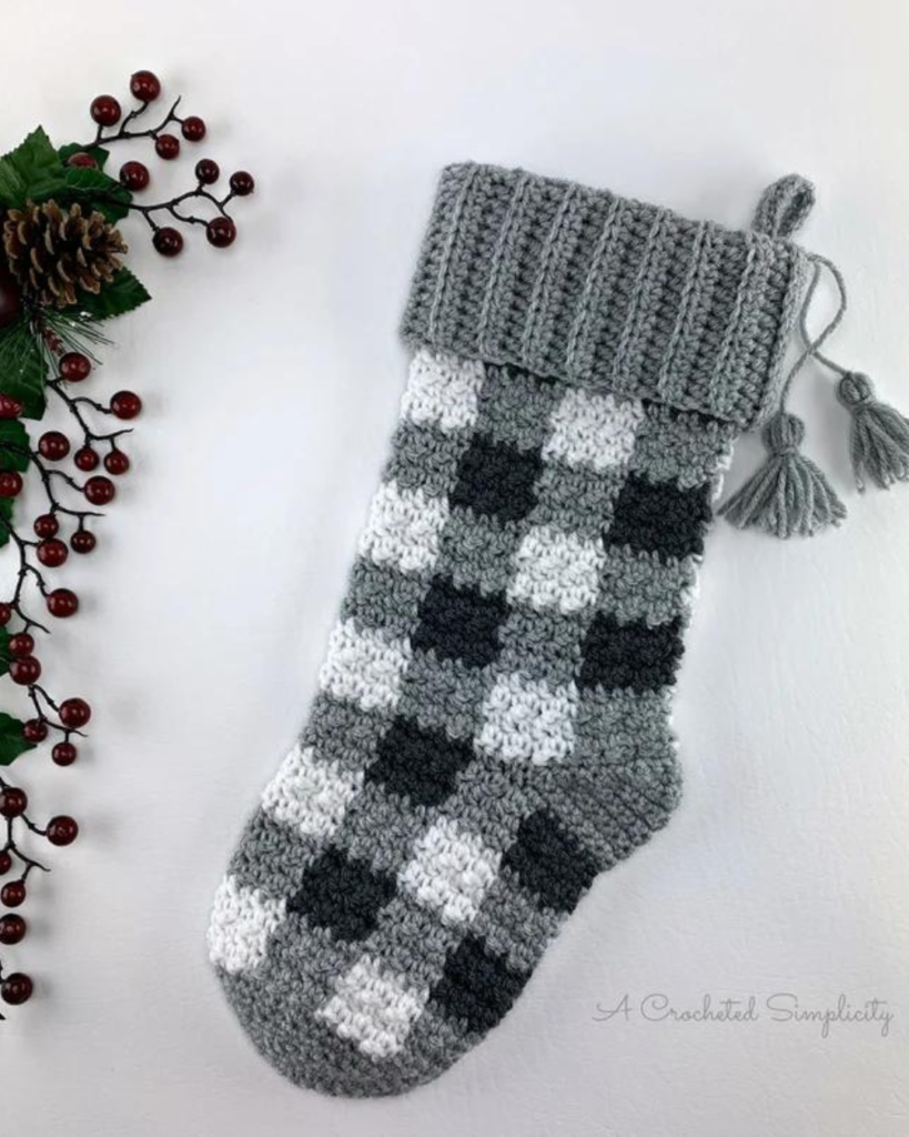 crochet black, grey, and white plaid christmas stocking