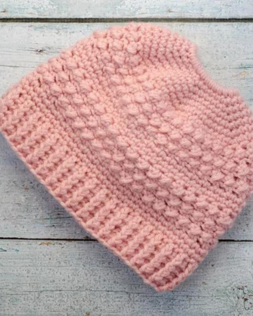 pink bobble stitch crochet ponytail hat