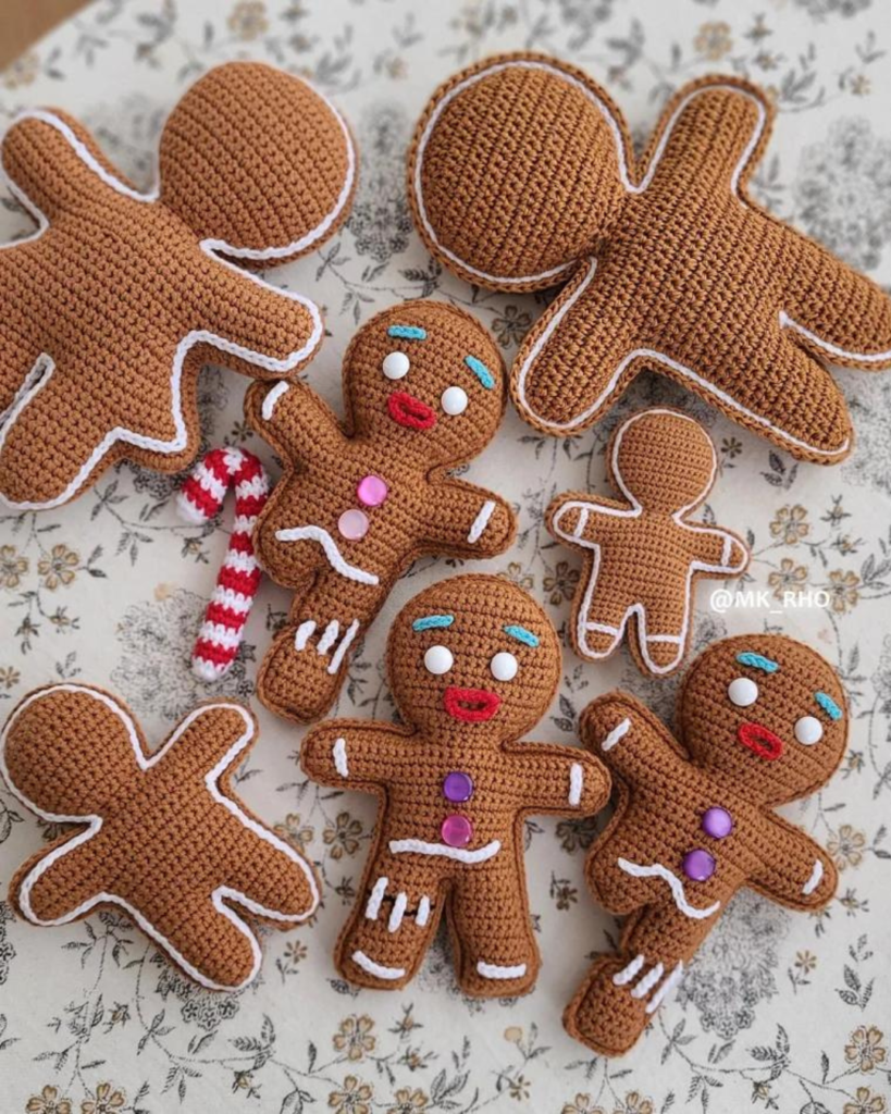 a variety of crochet amigurumi gingerbread men