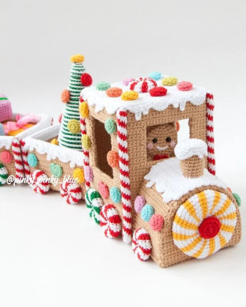 crochet candy train with christmas tree and gingerbread man