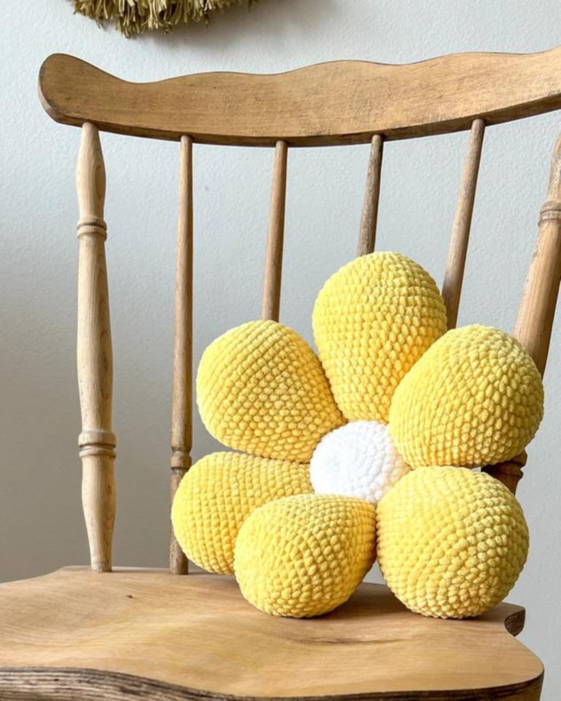 yellow crochet flower pillow