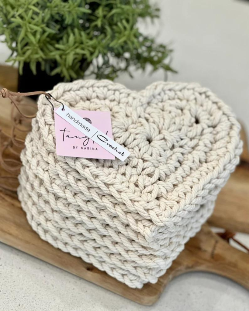 seven white crochet heart coasters