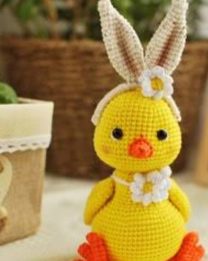 yellow crochet chick with bunny ears