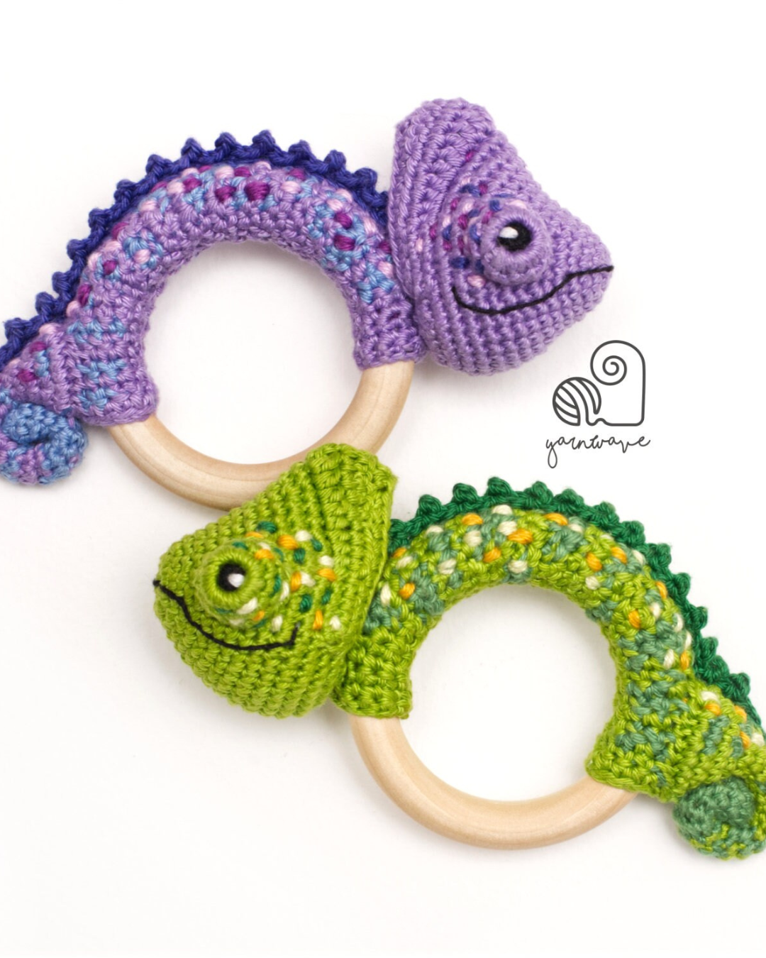two crochet chameleon baby rattles