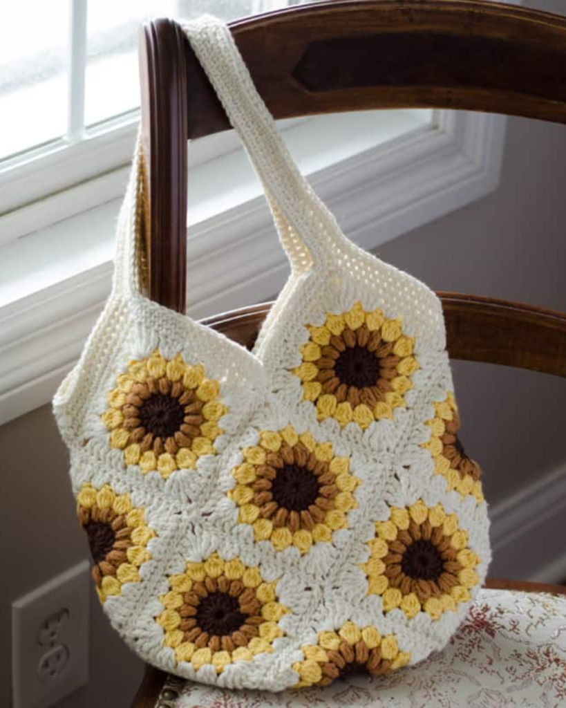 white crochet purse with sunflower granny squares