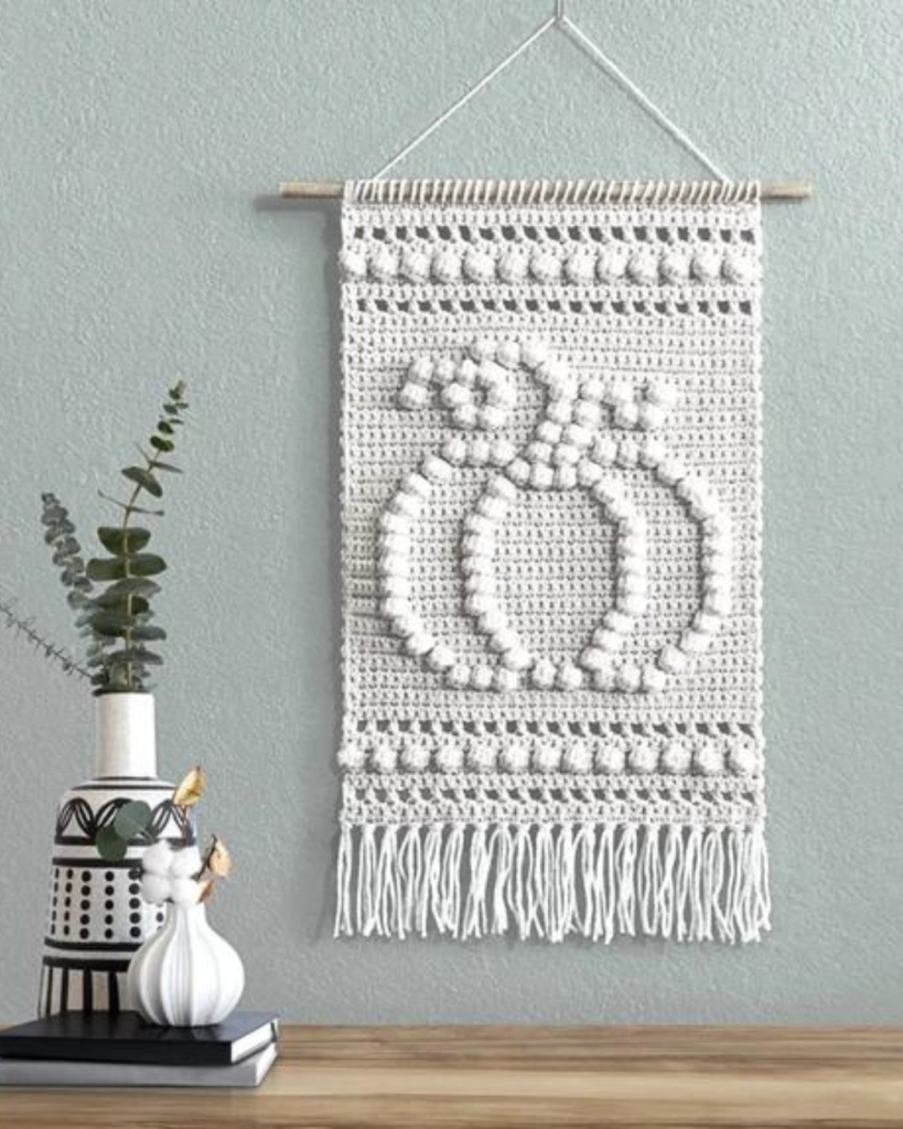 white pumpkin crochet wall hanging