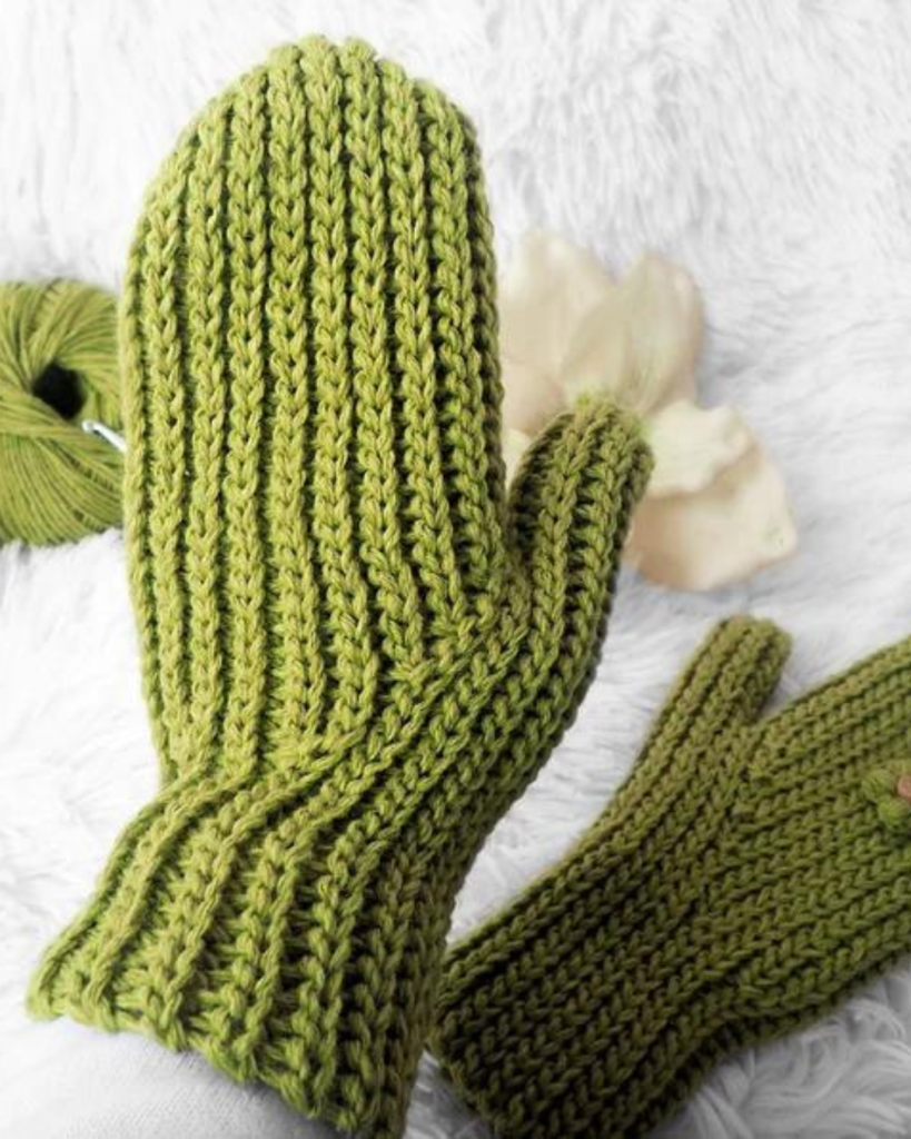 green crochet ribbed mittens