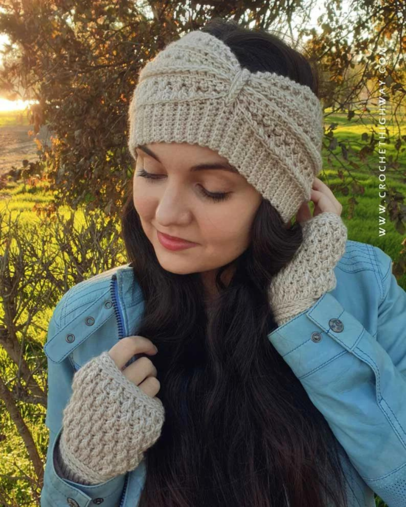 woman wearing beige fingerless gloves and ear warmer