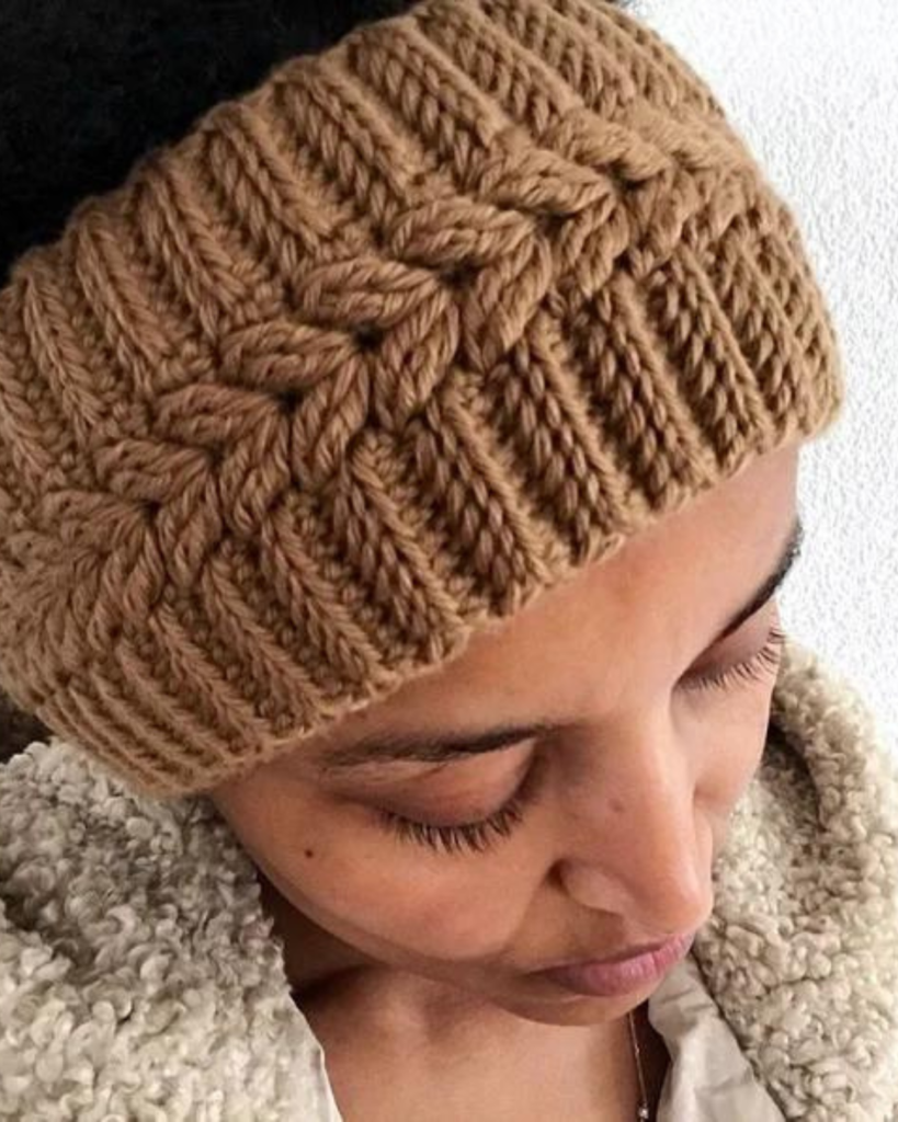 woman wearing brown crochet ear warmer