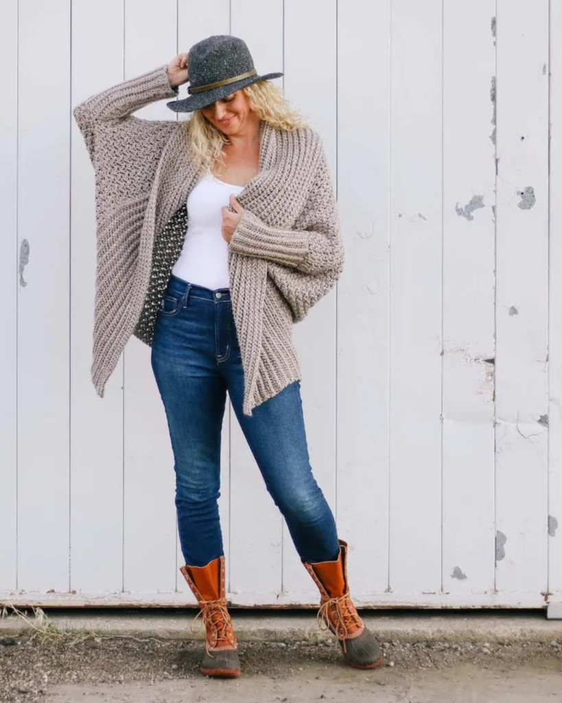 woman wearing grey crochet fall sweater