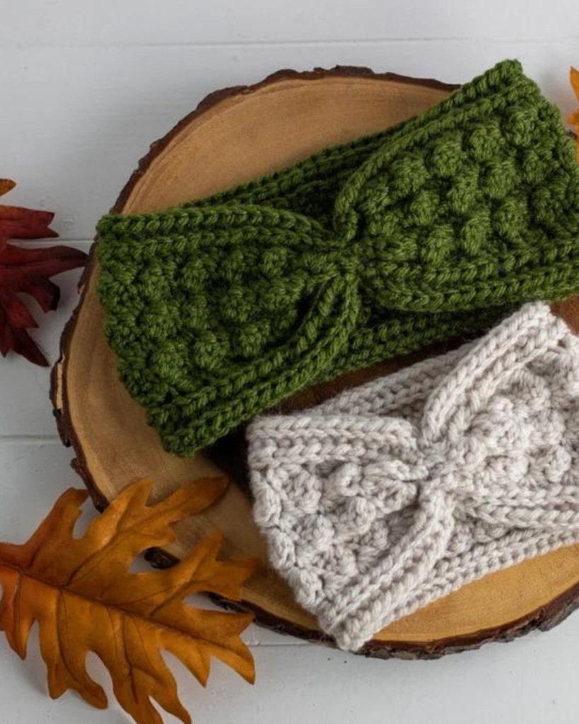 two crochet ear warmers in different colors and sizes