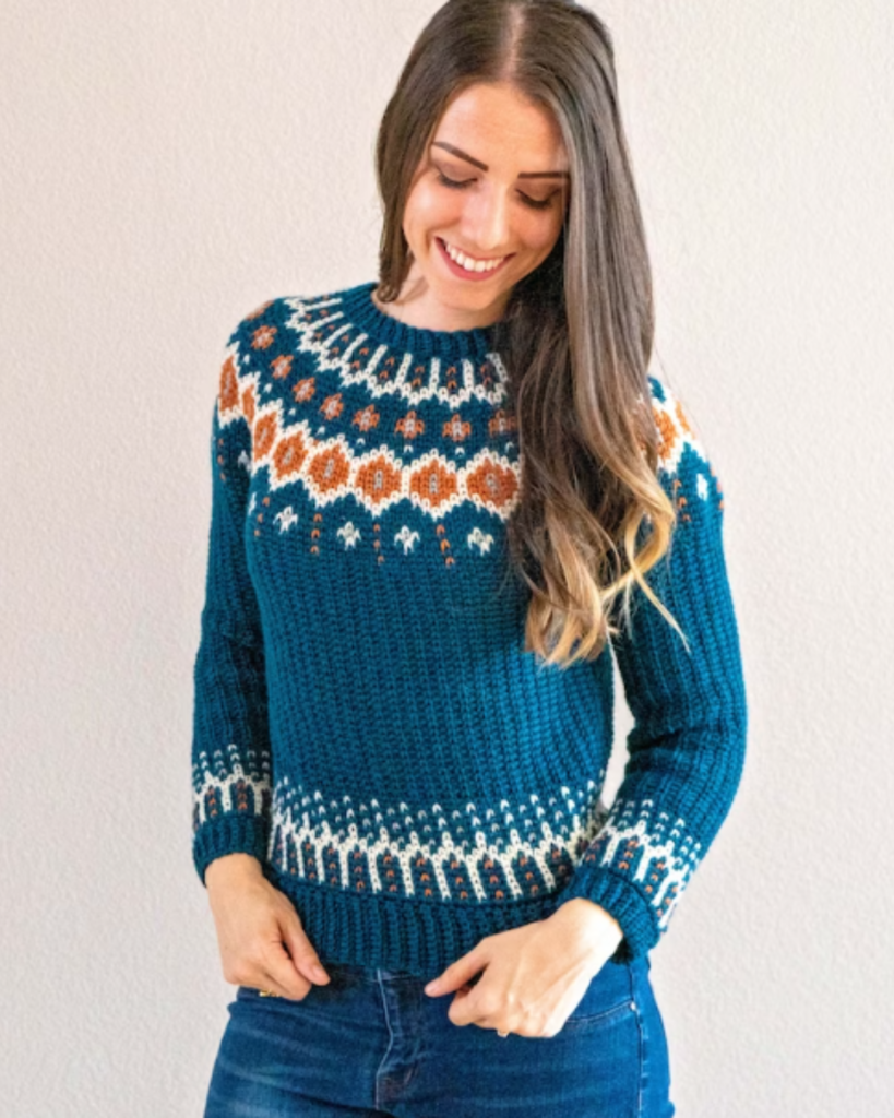 blue, orange, and white colorwork sweater