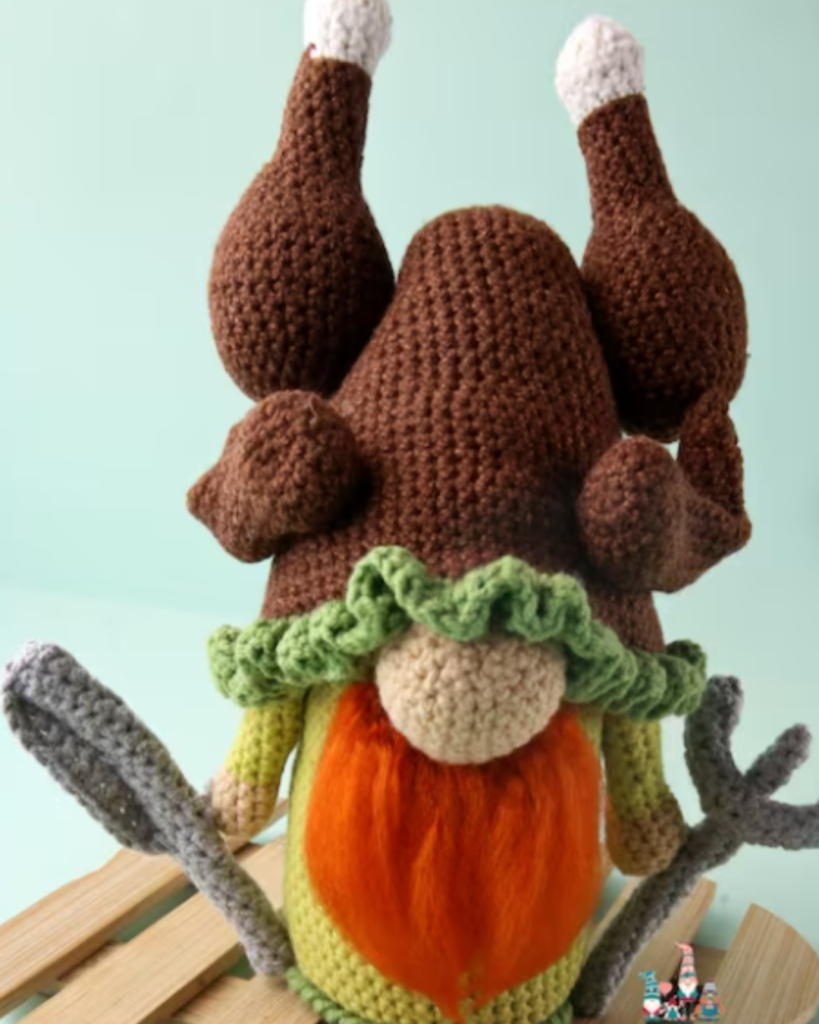crochet gnome with turkey on head
