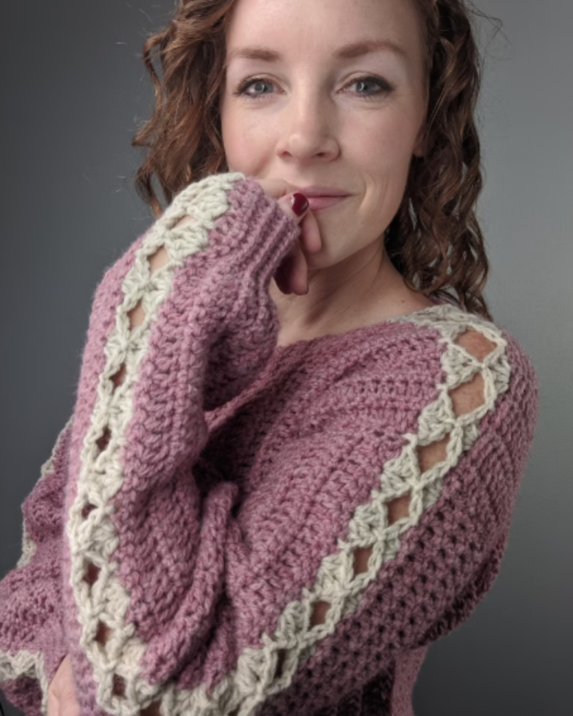 pink and white lacey crochet sweater