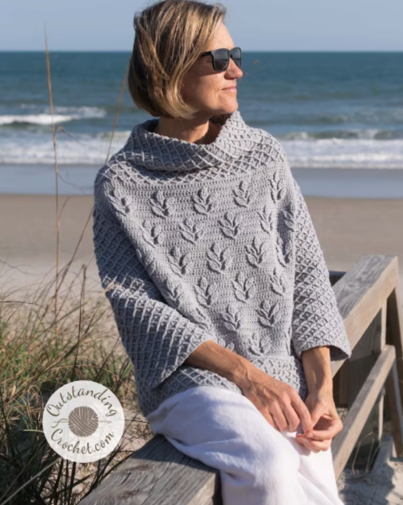 grey cable crochet poncho sweater