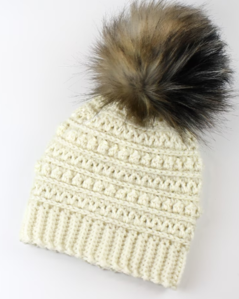 white crochet hat with various textures