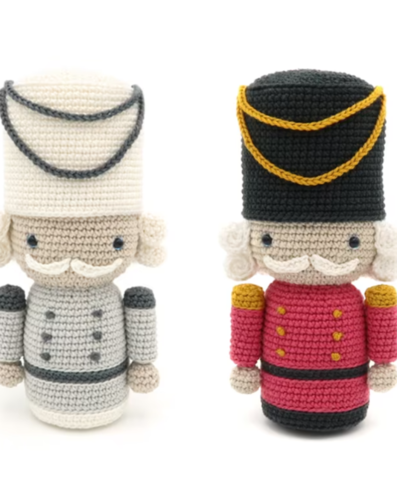 two crochet amigurumi nutcrackers