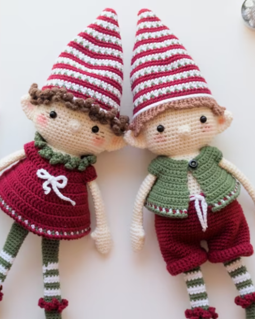 two crochet elf dolls