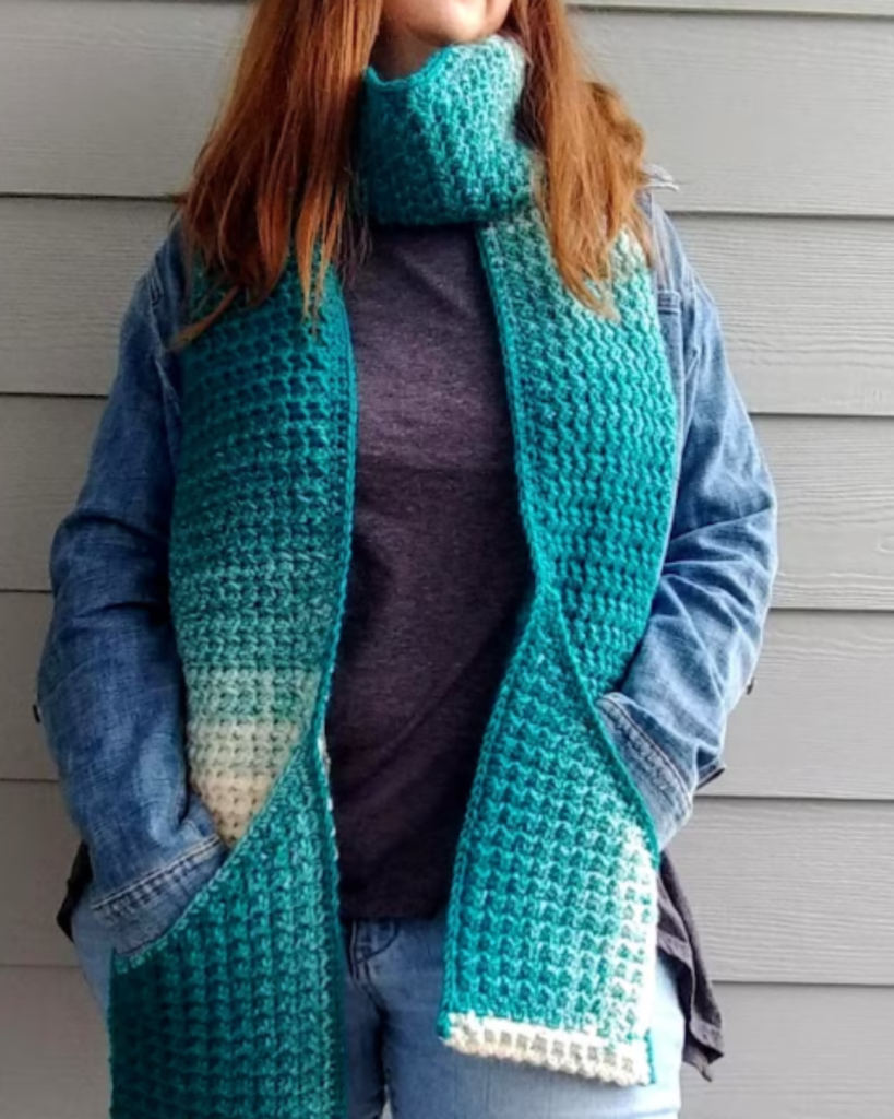 blue asymmetrical crochet pocket shawl
