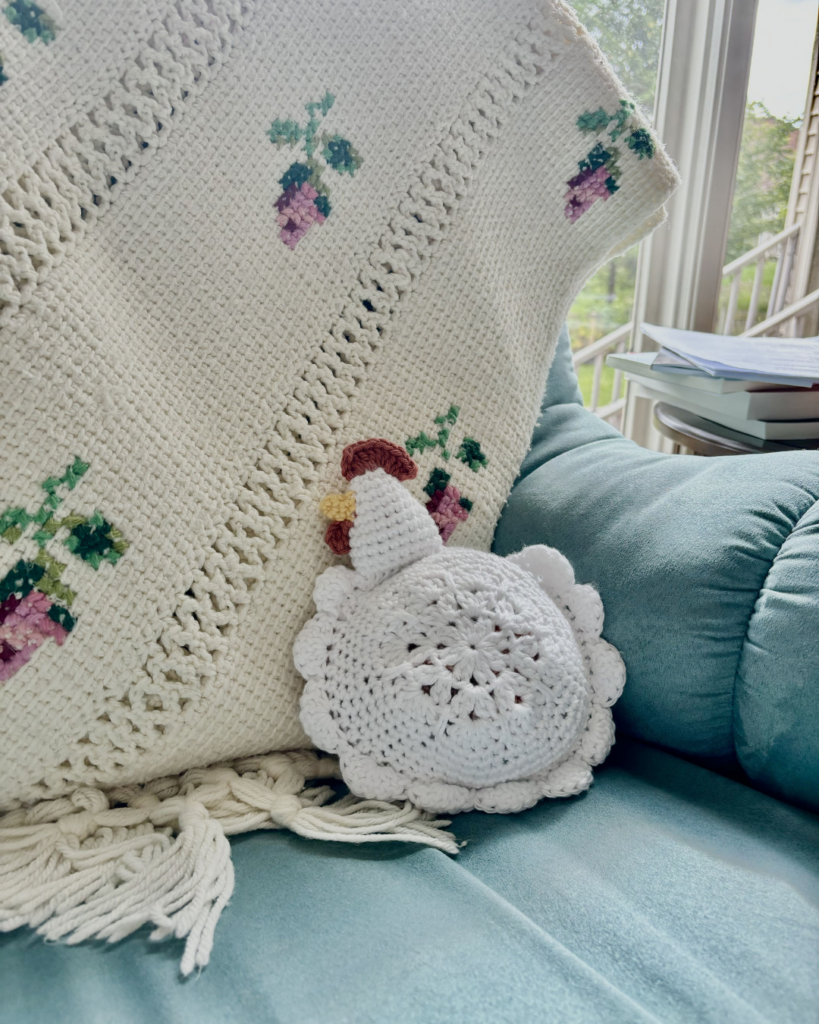 crochet chicken in blue chair