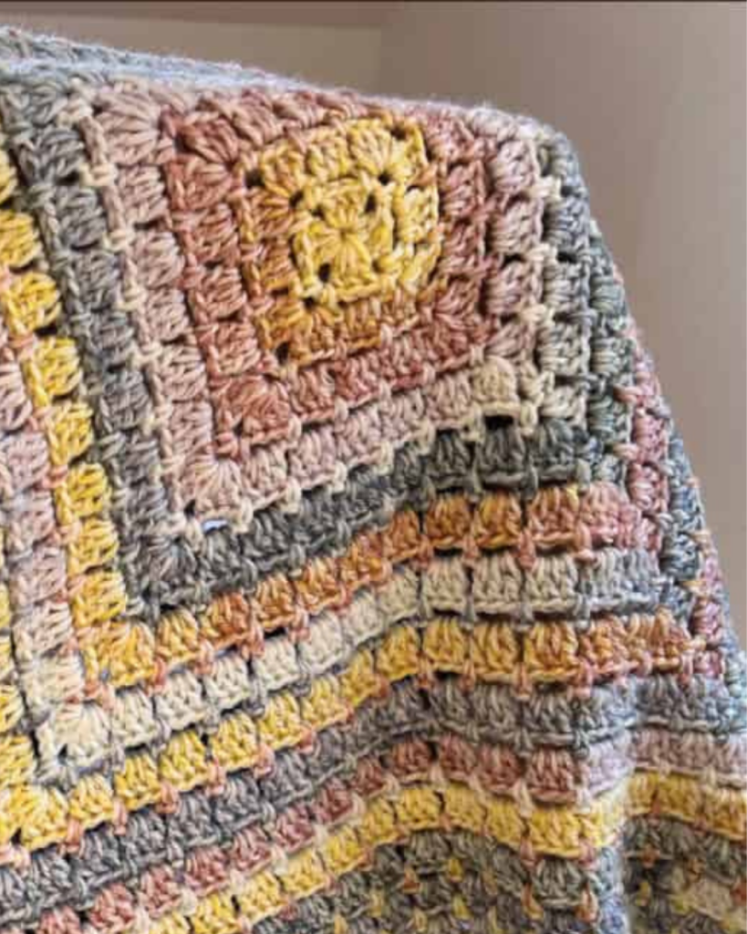 cozy crochet baby blanket with simple stitch pattern