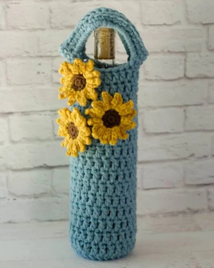 Sunflower crochet wine bottle holder designed for gifting or carrying a bottle