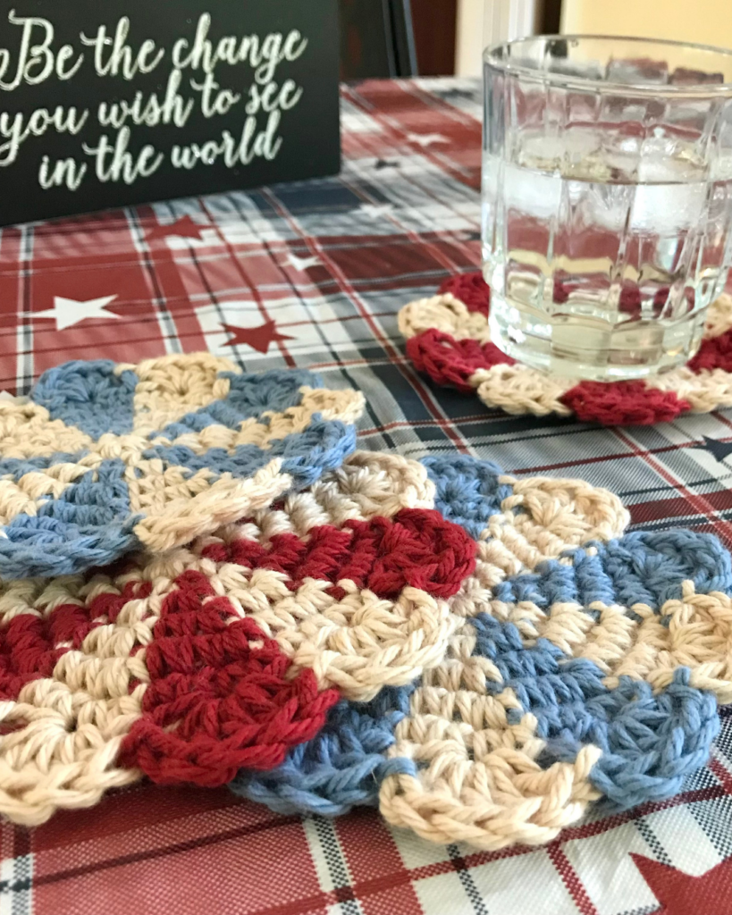 Set of pinwheel crochet coasters made with simple beginner-friendly stitches