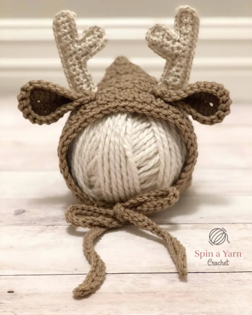 cute crochet baby reindeer hat with cozy texture and playful details