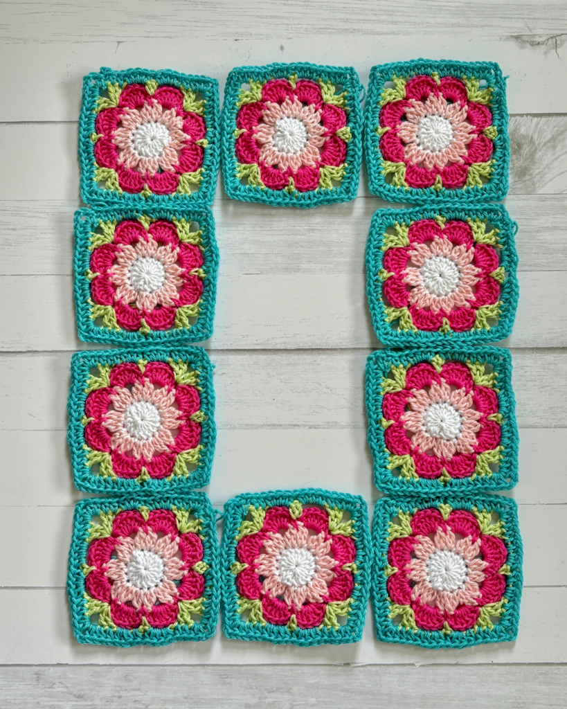 Close-up of flower granny squares for crochet baby dress