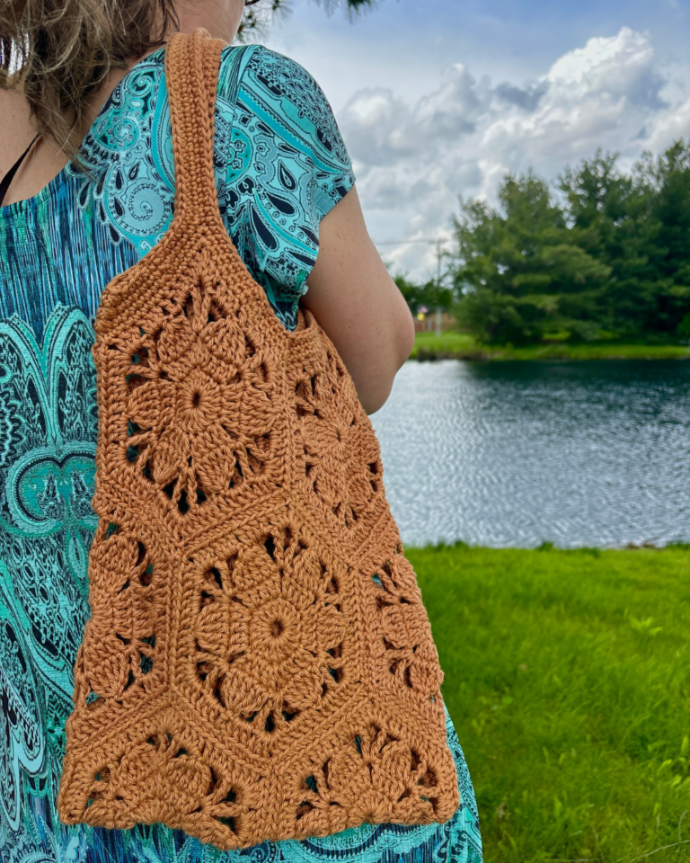 Floral crochet tote bag with boho-inspired earthy color palette