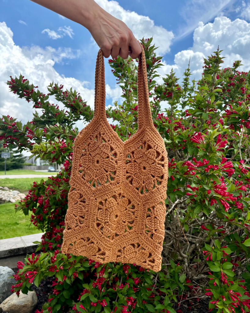 Handmade crochet tote with flower hexagon details and sturdy straps