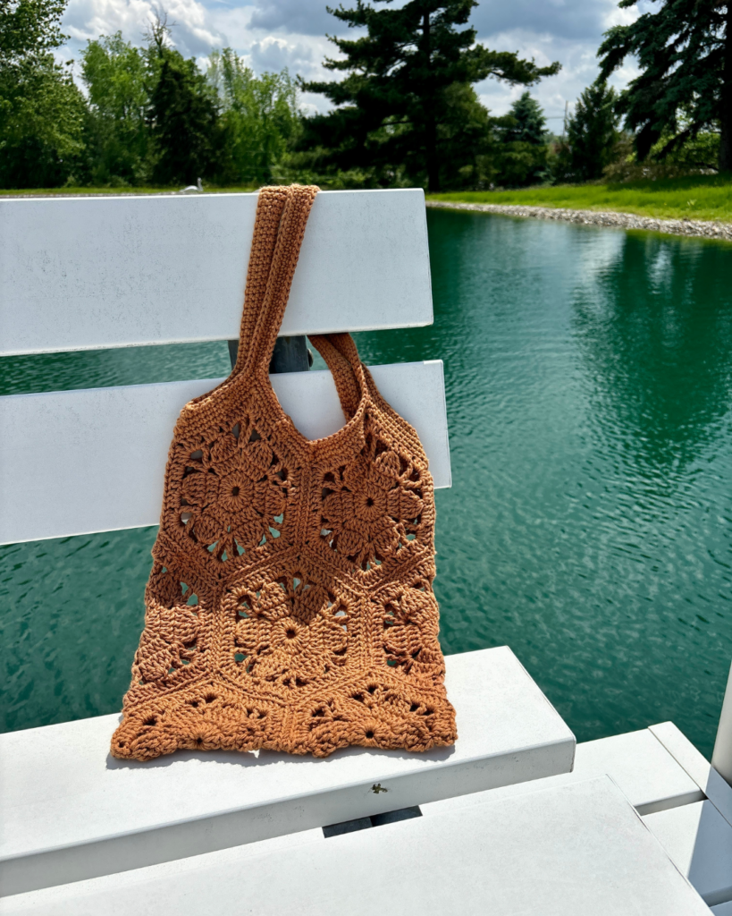 Boho crochet market bag with joined hexagon flower motifs