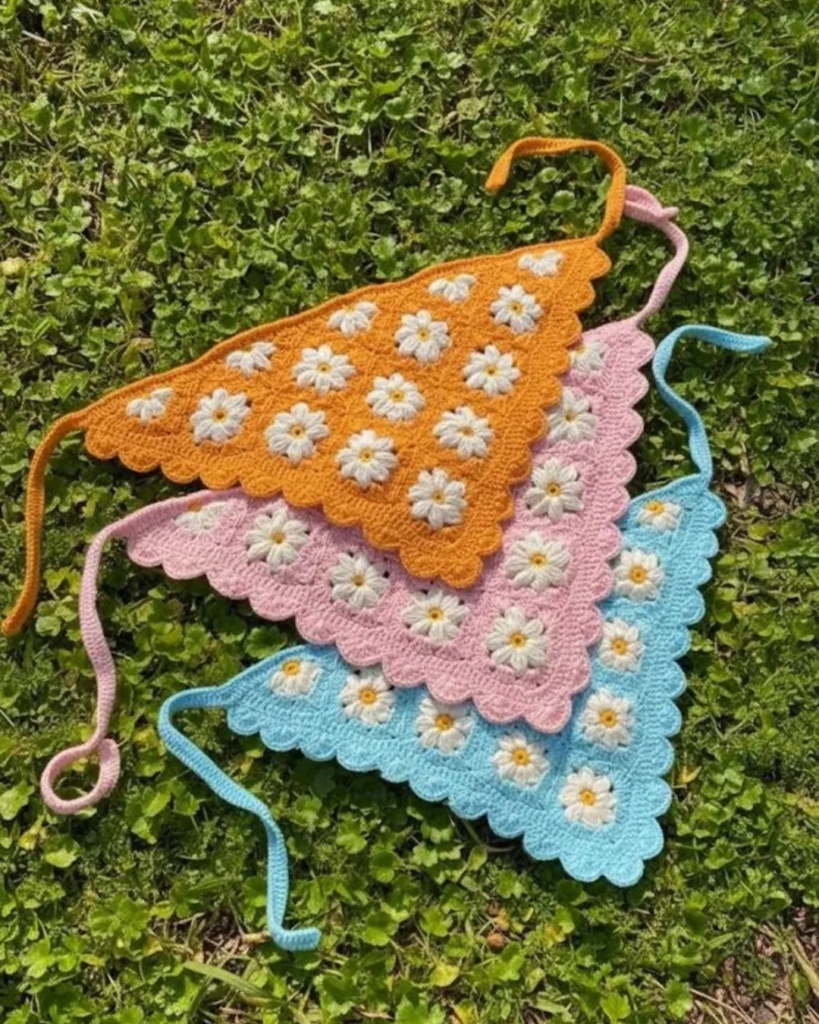 Crochet bandana featuring daisy details and a lightweight summer design