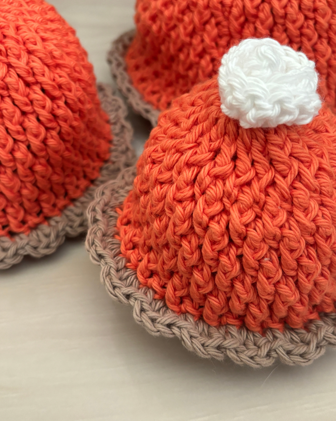 Pumpkin Pie Baby Hat crochet pattern with alpine stitch texture, ruffled pie crust brim, and whipped cream topper