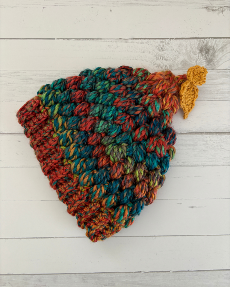 Front view of the Woodland Wanderer toddler beanie crocheted with textured puff stitches and soft wool-blend yarn